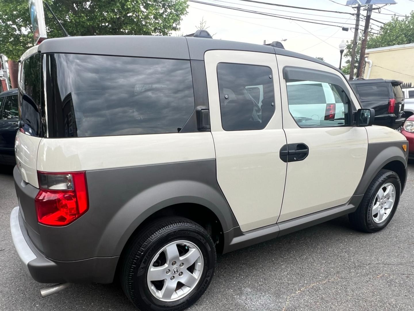 2005 Beige /Gray Honda Element EX 4WD 4-spd AT (5J6YH286X5L) with an 2.4L L4 DOHC 16V engine, 4 Speed Automatic Overdrive transmission, located at 1018 Brunswick Ave, Trenton, NJ, 08638, (609) 989-0900, 40.240086, -74.748085 - Photo#3